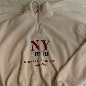 Graphic quarter zip sweater